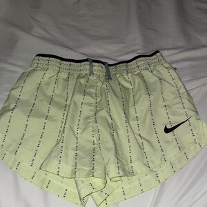Nike Women's Light Yellow Athletic Shorts